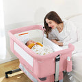 Pink Baby Bassinet Bedside Sleeper with Storage Basket Q500