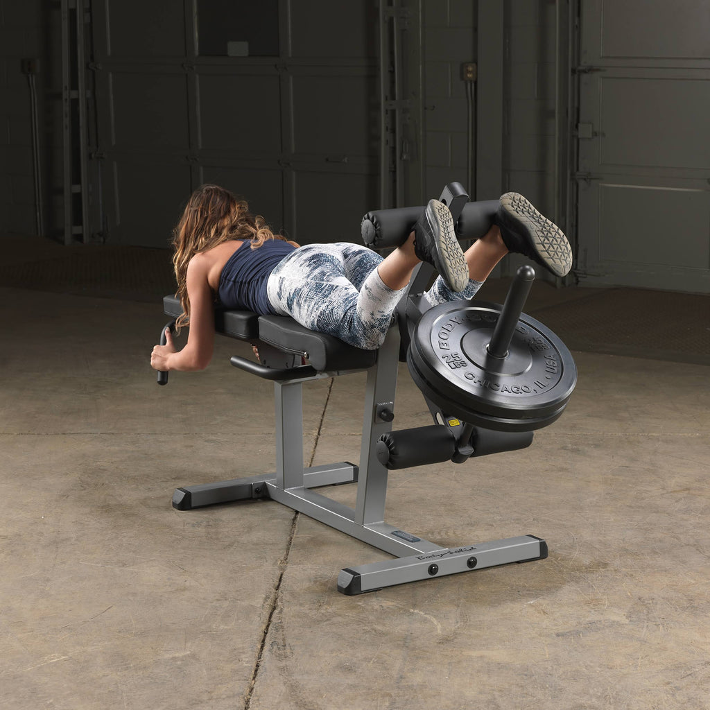 Seated Leg Extension and Supine Curl X9841